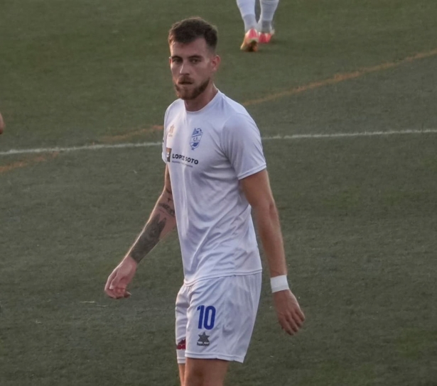 El jugador del Churriana CF, Nacho Buil, durante un encuentro 