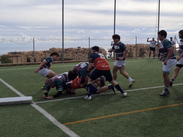 Imagen del partido del conjunto masculinos (ESCORIONES)