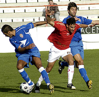 Lance del partido entre Granada 74 y Portuense (AYALA) Lance del partido entre Granada 74 y Portuense (AYALA)